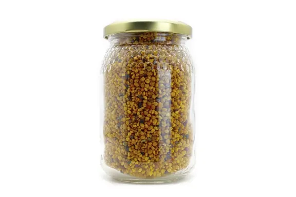 Tarro de cristal con polen en grano